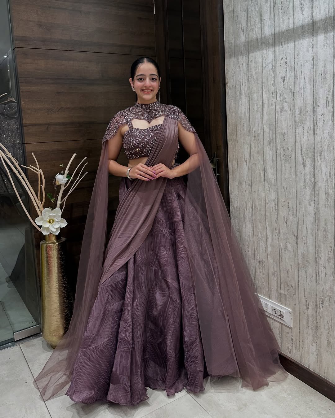 Embellished Mauve Designer Crop Top with Layered Lehenga and Cape Dupatta