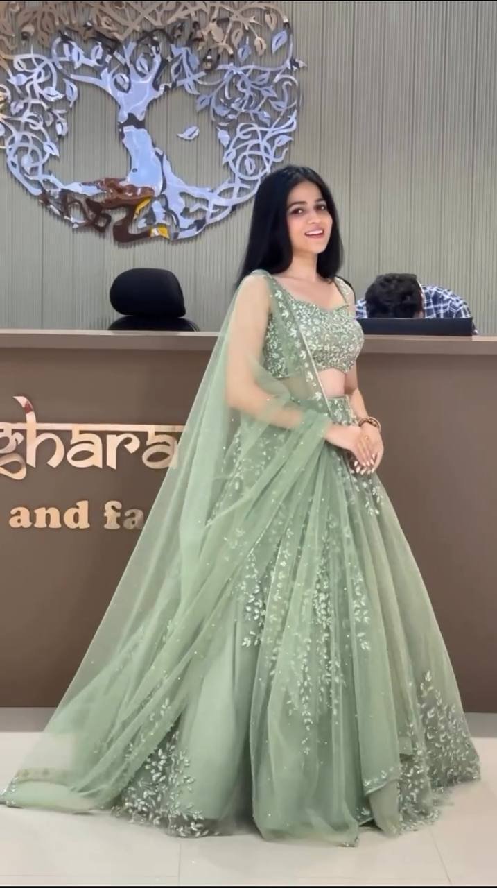 Pista Green Soft Butterfly Net Heavily Embroidered Lehenga Choli Set - Image 3