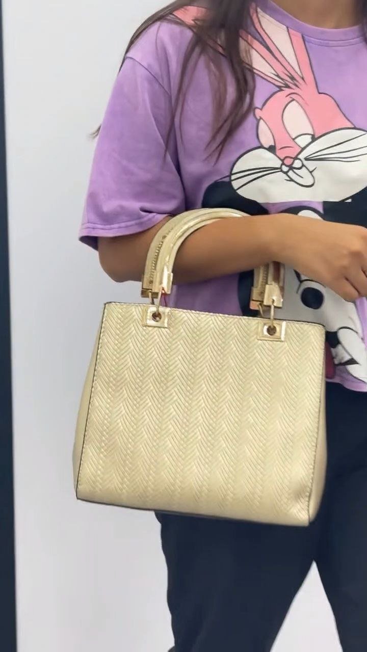Elegant Gold Textured Handbag with Dual Handles