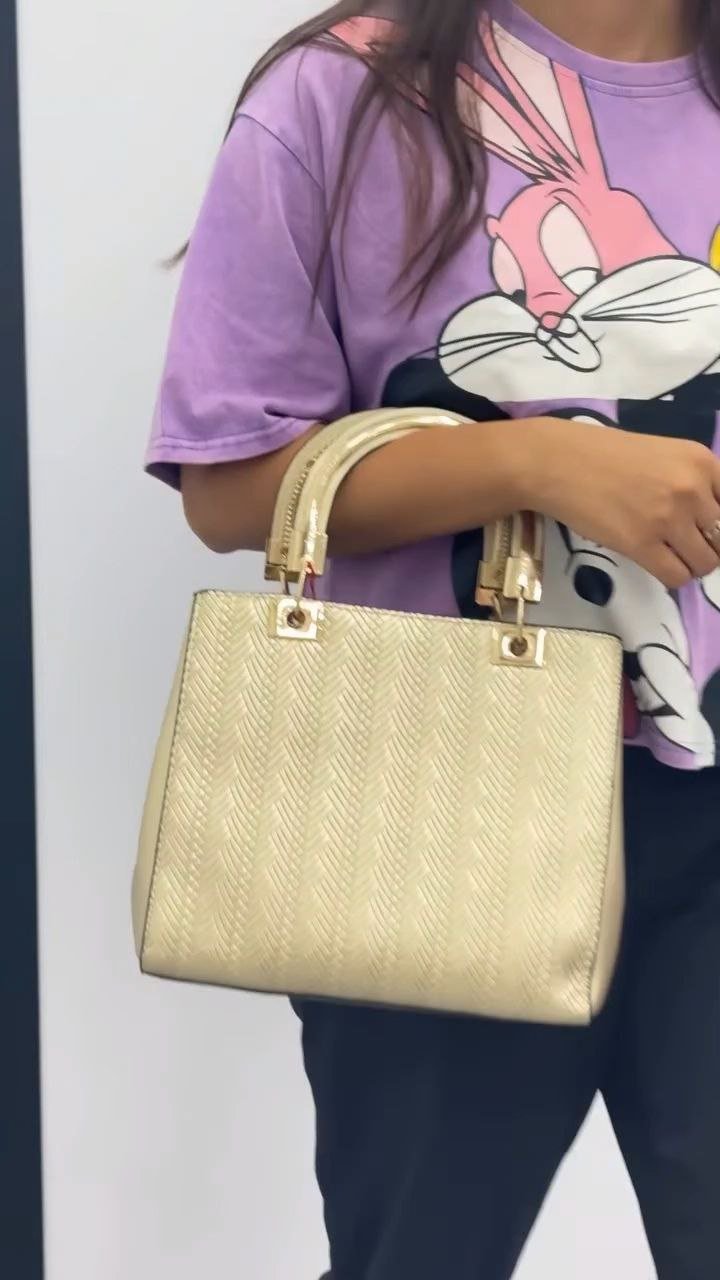 Elegant Gold Textured Handbag with Dual Handles - Image 3
