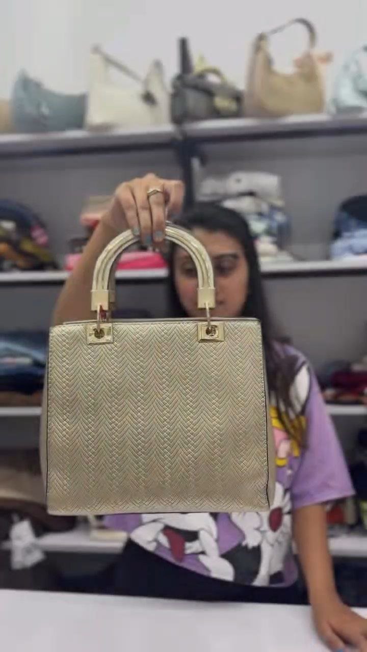 Elegant Gold Textured Handbag with Dual Handles - Image 4