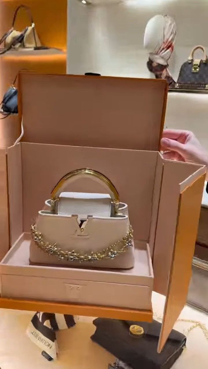 Elegant Mini Top-Handle Handbag with Decorative Chain
