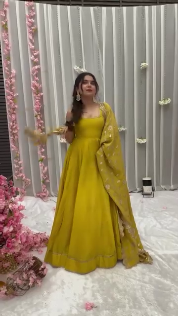 Mustard Yellow Solid Flared Gown Set with Gota Tassels and Banarasi Dupatta